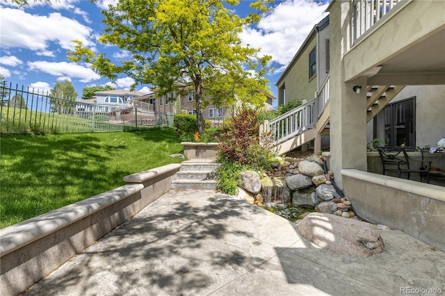 7081 Salvia St, Arvada, CO 80007 - view of home's community featuring stairs and a patio area