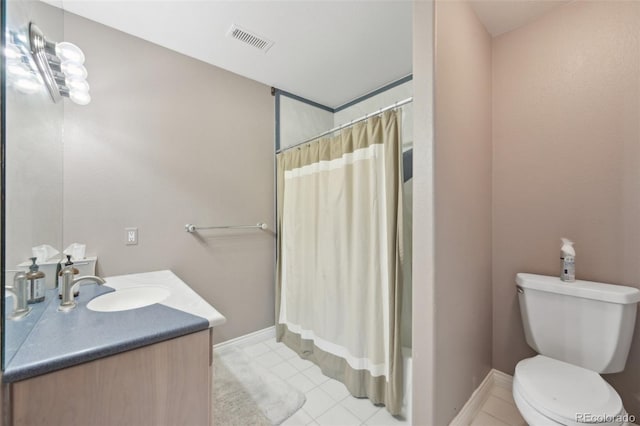 7081 Salvia St, Arvada, CO 80007 - bathroom with vanity, tile patterned floors, and shower / tub combo