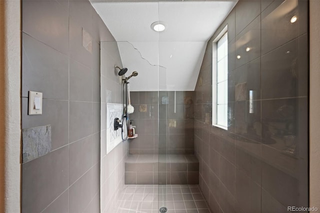 7081 Salvia St, Arvada, CO 80007 - full bath with a tile shower and lofted ceiling