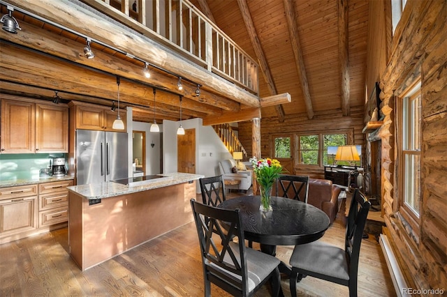 80 Spruce Ct, Evergreen, CO 80439 - dining space featuring wood finished floors, stairway, a wood ceiling with exposed beams, and rail lighting