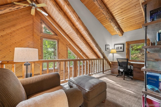 80 Spruce Ct, Evergreen, CO 80439 - home office with a wooden ceiling with exposed beams, ceiling fan, wooden walls, carpet floors, and high vaulted ceiling