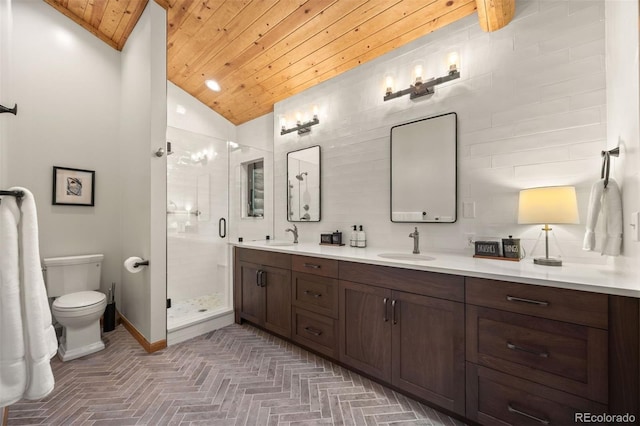 80 Spruce Ct, Evergreen, CO 80439 - full bath featuring wood ceiling, double vanity, a stall shower, lofted ceiling, and brick patterned floors