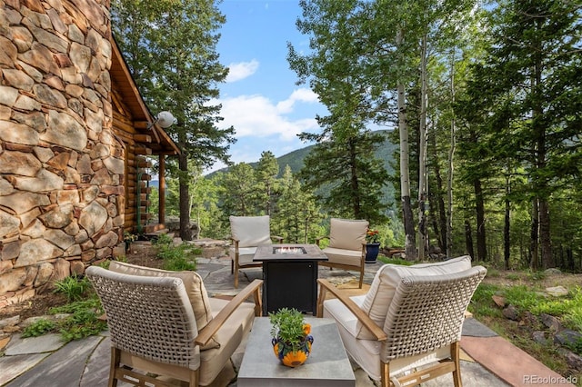 80 Spruce Ct, Evergreen, CO 80439 - view of patio featuring an outdoor fire pit