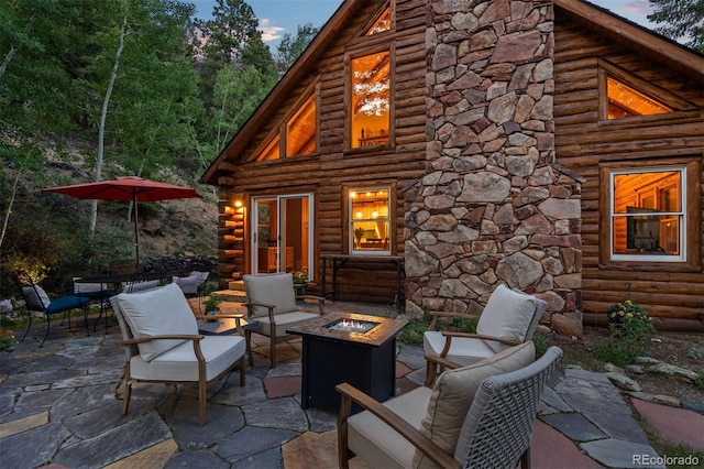 80 Spruce Ct, Evergreen, CO 80439 - view of patio with a fire pit