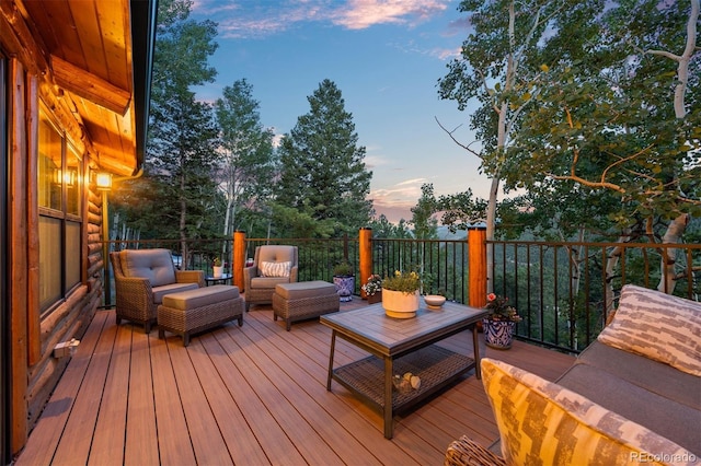 80 Spruce Ct, Evergreen, CO 80439 - wooden deck with an outdoor living space