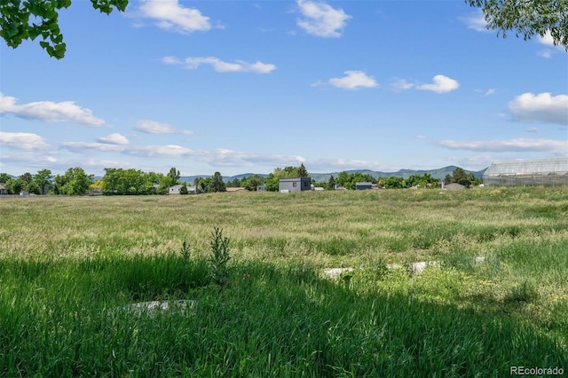 4899 S Dudley St Unit 7E, Littleton, CO 80123 - view of undeveloped land featuring a mountainous background and rural landscape