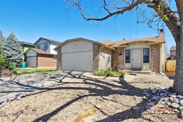 ranch-style house featuring fence, brick siding, concrete driveway, a garage, and a chimney