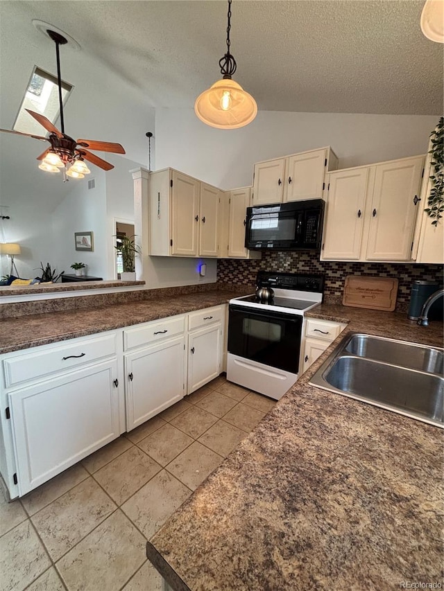 kitchen featuring a textured ceiling, a sink, black microwave, electric stove, and dark countertops