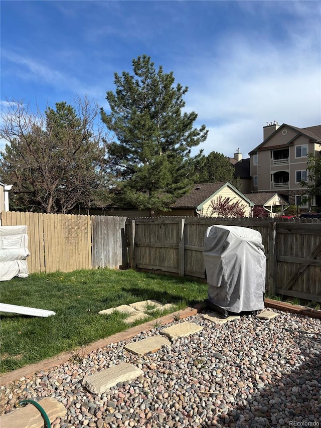 view of yard featuring a fenced backyard and a patio
