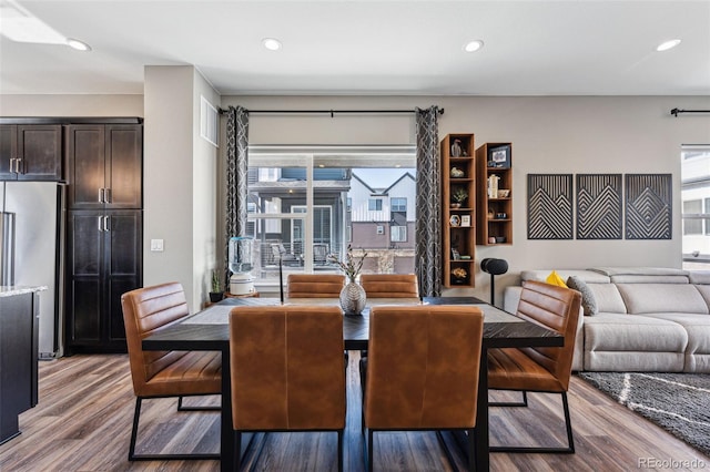 dining room with hardwood / wood-style floors