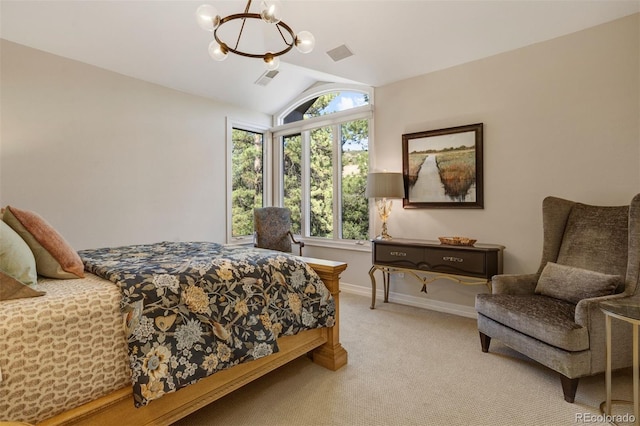 carpeted bedroom with a notable chandelier and vaulted ceiling