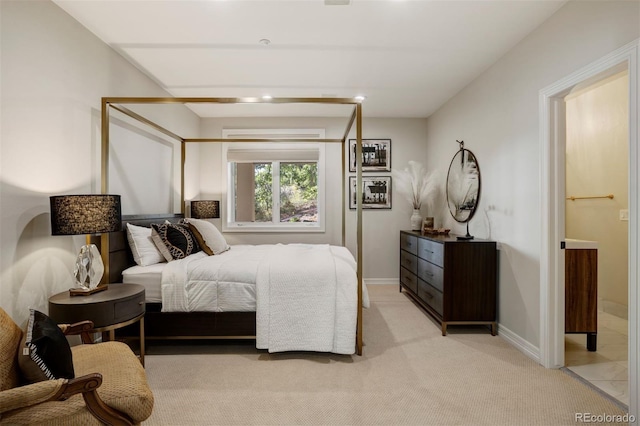 bedroom with light colored carpet