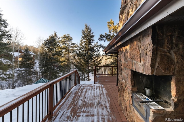 view of snow covered deck