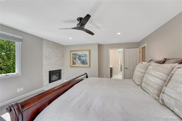 10289 E Berry Dr, Greenwood Village, CO 80111 - bedroom with a fireplace, recessed lighting, ensuite bathroom, and ceiling fan