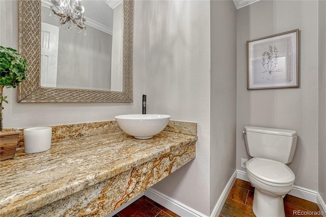 10289 E Berry Dr, Greenwood Village, CO 80111 - bathroom featuring ornamental molding, a chandelier, and vanity