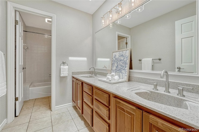 10289 E Berry Dr, Greenwood Village, CO 80111 - full bathroom featuring double vanity, tile patterned floors, and bathtub / shower combination
