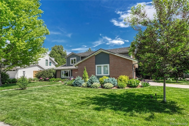 10289 E Berry Dr, Greenwood Village, CO 80111 - view of front of property with brick siding and a front yard