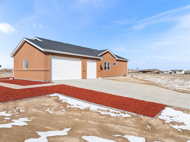 exterior space with a garage