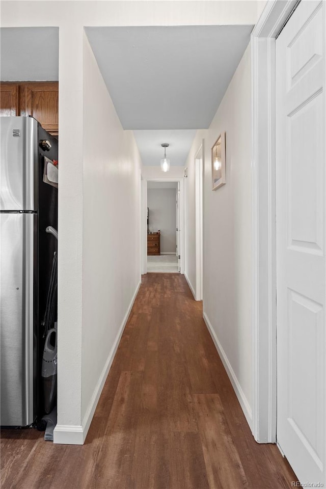 hallway featuring dark hardwood / wood-style floors