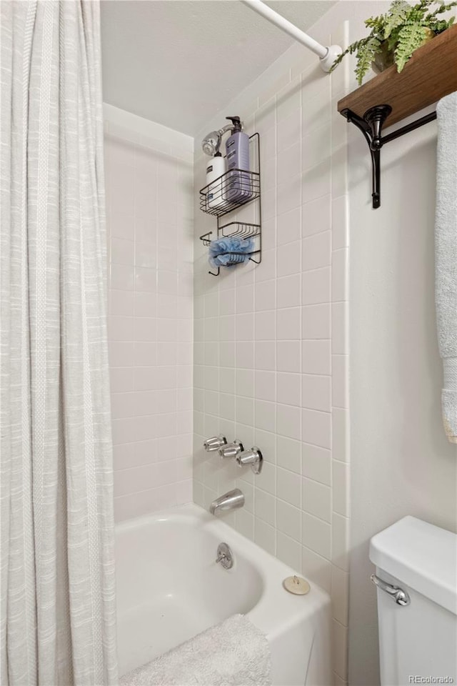 bathroom with toilet and shower / bathtub combination with curtain