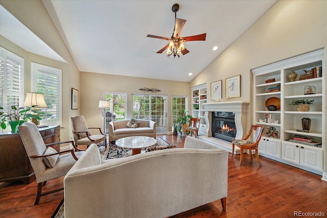 4545 S Monaco St Unit 243, Denver, CO 80237 - living room with wood finished floors, a premium fireplace, a ceiling fan, recessed lighting, and built in features
