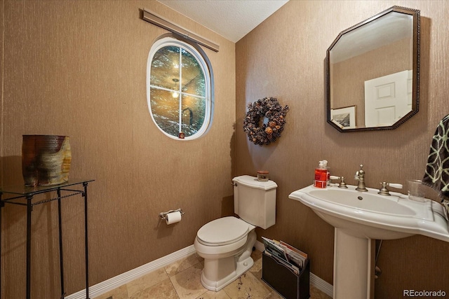 4545 S Monaco St Unit 243, Denver, CO 80237 - half bath with toilet and baseboards