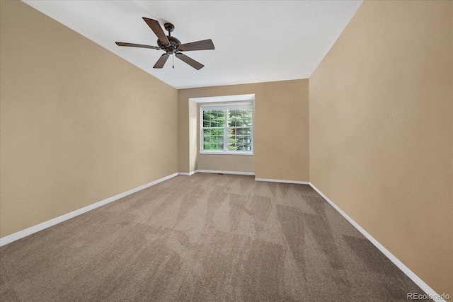 4545 S Monaco St Unit 243, Denver, CO 80237 - spare room with carpet floors, baseboards, and ceiling fan