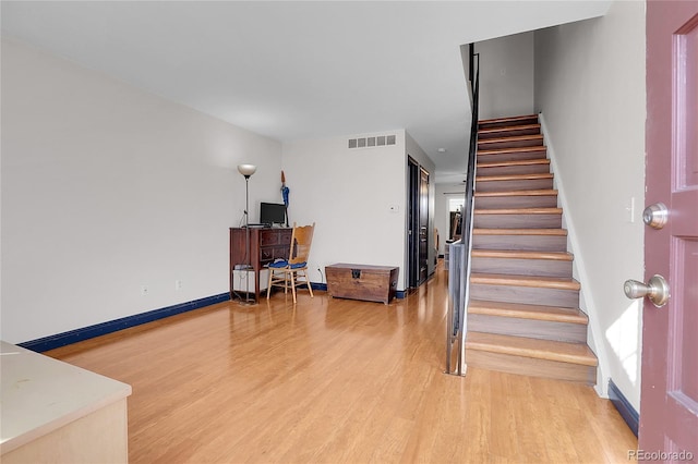 interior space with hardwood / wood-style flooring