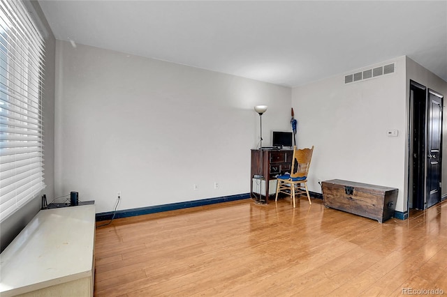 misc room with hardwood / wood-style floors