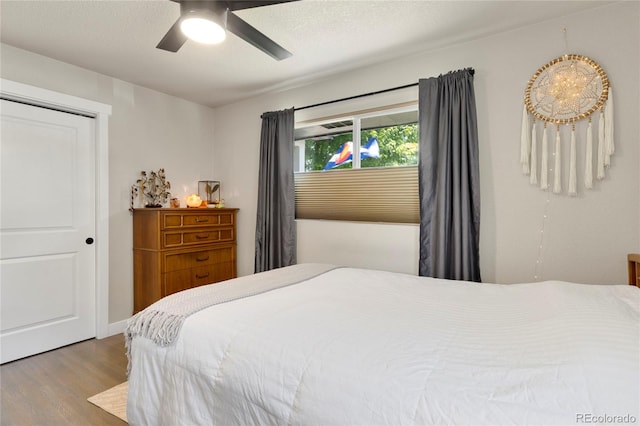 2313 S Raleigh St, Denver, CO 80219 - bedroom featuring wood finished floors and ceiling fan