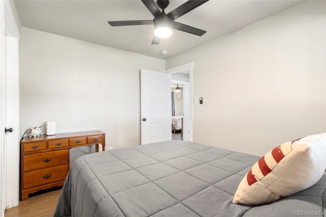 2313 S Raleigh St, Denver, CO 80219 - bedroom featuring light wood-type flooring and ceiling fan