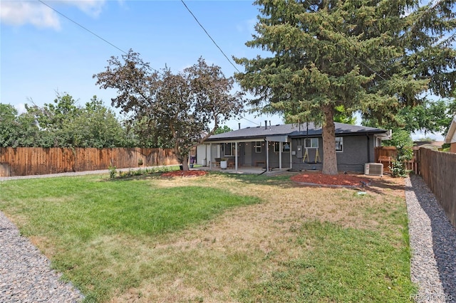 2313 S Raleigh St, Denver, CO 80219 - fenced backyard with a patio