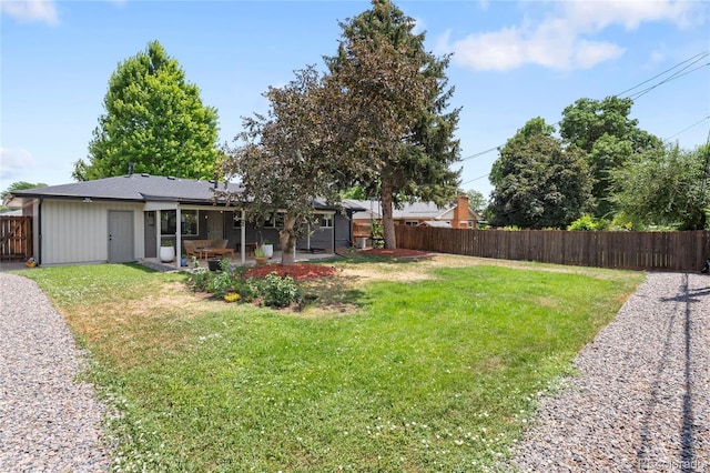 2313 S Raleigh St, Denver, CO 80219 - fenced backyard featuring a patio area