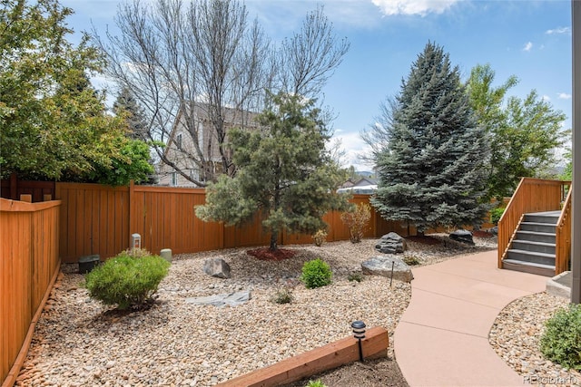11460 W Tanforan Cir, Littleton, CO 80127 - fenced backyard with stairway