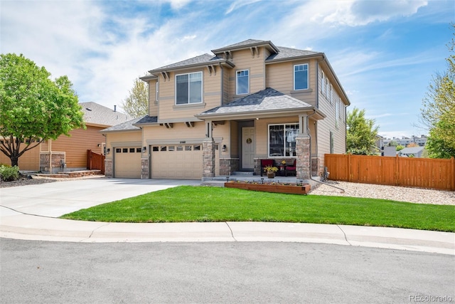 11460 W Tanforan Cir, Littleton, CO 80127 - view of front of home featuring concrete driveway and stone siding