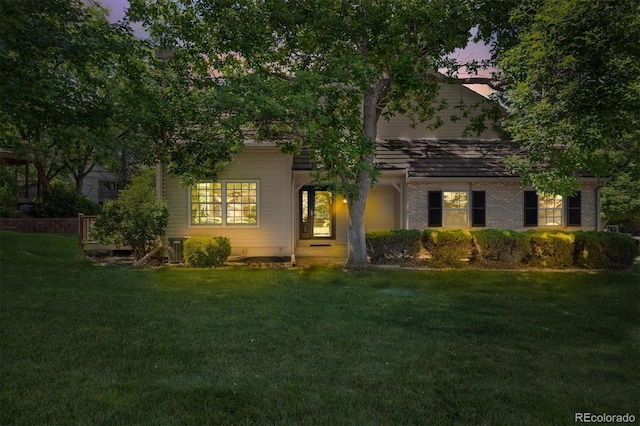 5922 E Briarwood Dr, Centennial, CO 80112 - obstructed view of property featuring a lawn