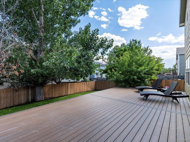 11082 Fillmore Way, Northglenn, CO 80233 - deck featuring a fenced backyard