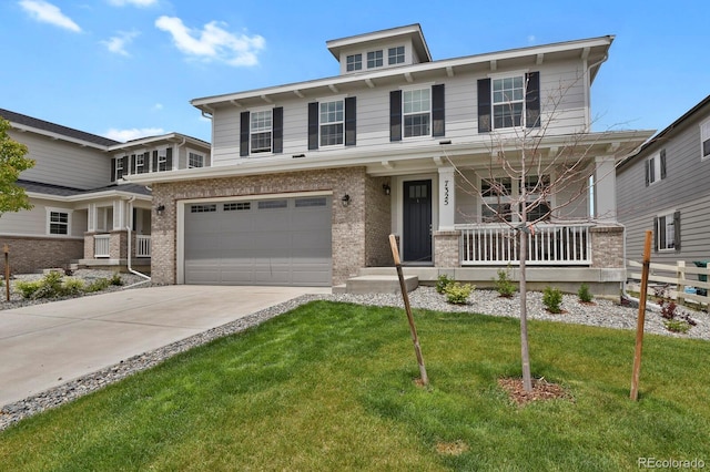7325 S Waterloo Way, Aurora, CO 80016 - view of front facade with a porch, an attached garage, concrete driveway, a front yard, and brick siding