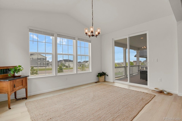 7325 S Waterloo Way, Aurora, CO 80016 - unfurnished sunroom with a chandelier and vaulted ceiling