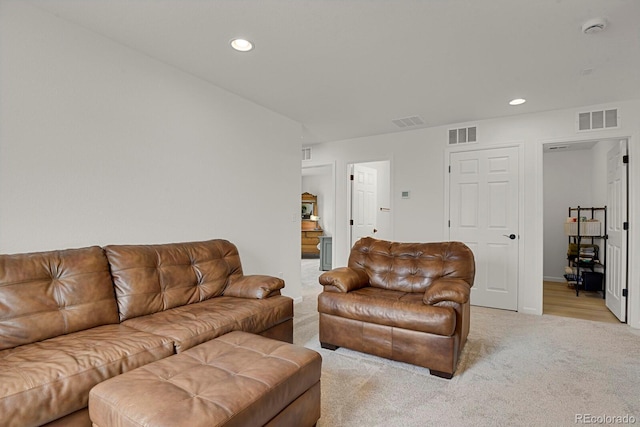 7325 S Waterloo Way, Aurora, CO 80016 - living area featuring light carpet and recessed lighting