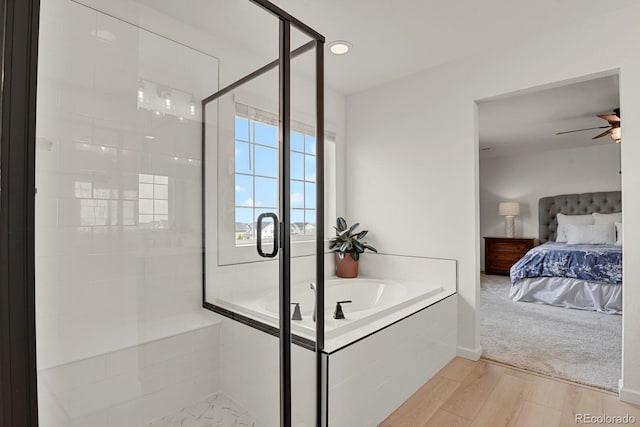 7325 S Waterloo Way, Aurora, CO 80016 - full bathroom with a bath, a stall shower, ensuite bathroom, and a ceiling fan