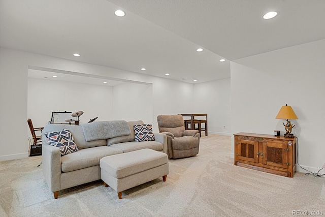 7325 S Waterloo Way, Aurora, CO 80016 - living area with light colored carpet, recessed lighting, and baseboards