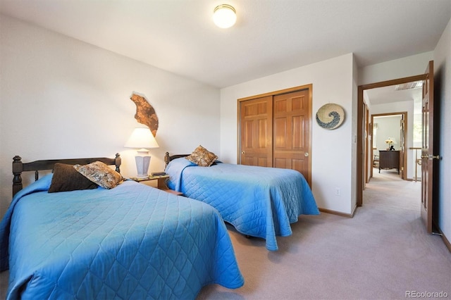 12963 W 84th Pl, Arvada, CO 80005 - bedroom with a closet and light colored carpet
