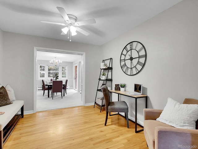 5895 W Plymouth Dr, Littleton, CO 80128 - office area featuring a chandelier, light wood-style floors, and ceiling fan