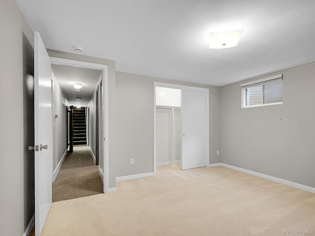 5895 W Plymouth Dr, Littleton, CO 80128 - unfurnished bedroom with light colored carpet and a closet
