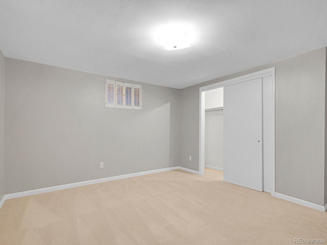 5895 W Plymouth Dr, Littleton, CO 80128 - unfurnished bedroom featuring light colored carpet and a closet