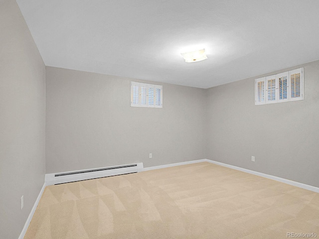 5895 W Plymouth Dr, Littleton, CO 80128 - below grade area featuring baseboard heating and carpet flooring