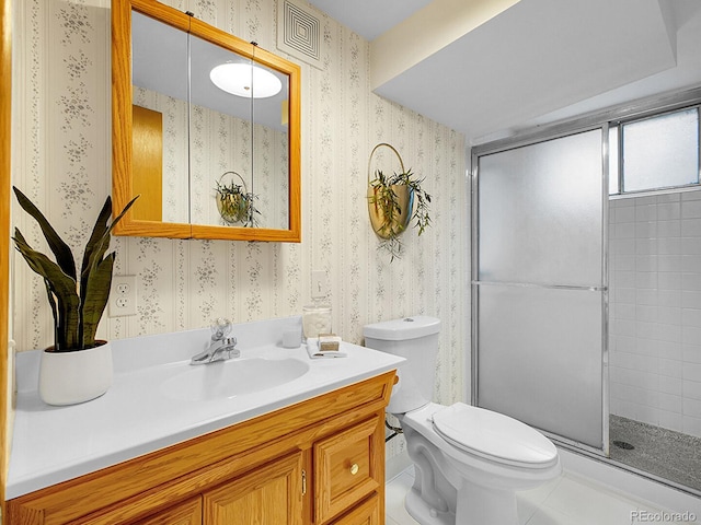 5895 W Plymouth Dr, Littleton, CO 80128 - full bathroom featuring wallpapered walls, vanity, and a stall shower