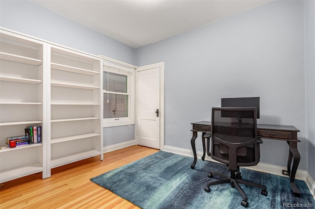 office area with wood-type flooring