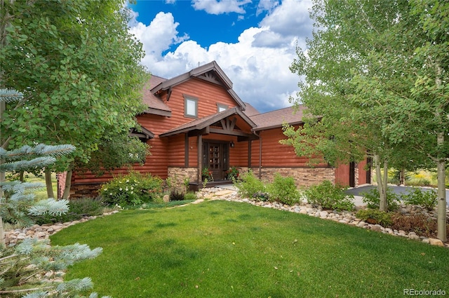 log cabin featuring a front yard